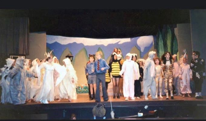 in centre is nathan fagg as edmund and jason fagg as pete with the residents of Narnia